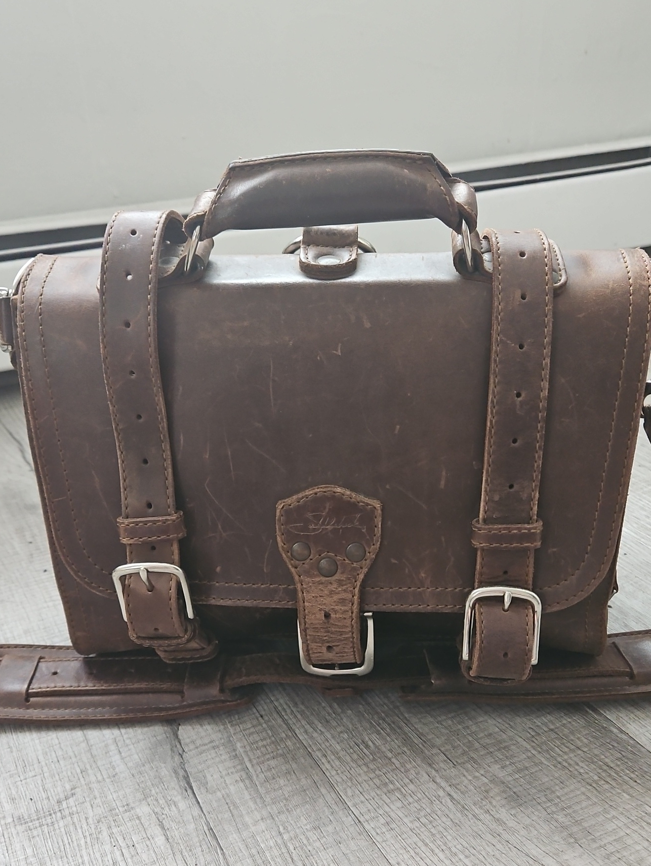 Saddleback Leathers Convertible Briefcase/Backpack With Adjustable Straps.